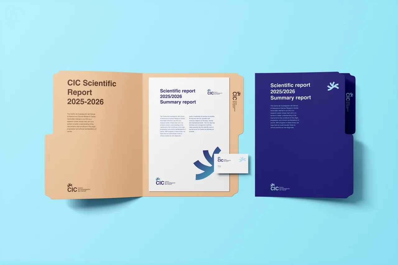 Carpeta y documentos de la memoria científica con la nueva identidad